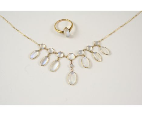 A MOONSTONE AND GOLD DROP NECKLACE the gold chain is set with seven graduated oval cabochon moonstones, each suspending an ov