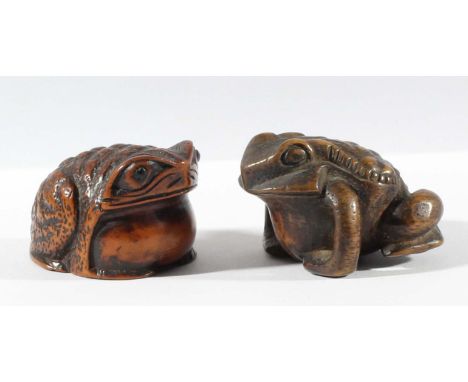 TWO JAPANESE BOXWOOD NETSUKE, carved as toads, unsigned (2)