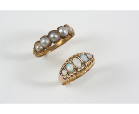 A GEORGIAN PEARL AND GOLD RING set with five half pearls, size P 1/2, together with an opal five stone ring, set in 9ct. gold