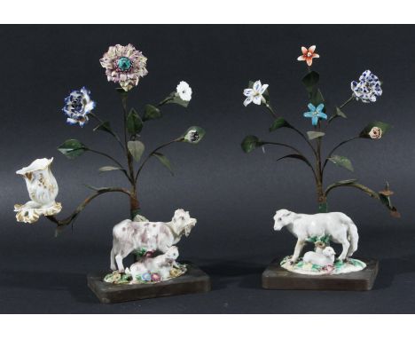 PAIR OF BOW GROUPS,  circa 1770, modelled as a sheep and a goat with young on floral encrusted bases, with later metal mounts