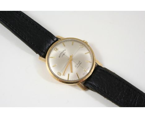 A GENTLEMAN'S GOLD WRISTWATCH BY ROTARY the signed circular dial with baton numerals and Arabic quarters, 35mm. dia., on a bl