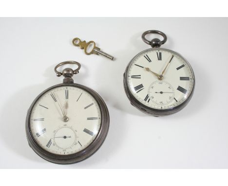 A SILVER OPEN FACED POCKET WATCH the white enamel dial with Roman numerals and subsidiary seconds dial, the movement signed J
