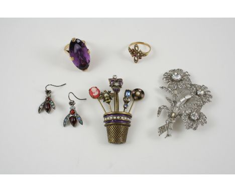 A QUANTITY OF JEWELLERY including a large amethyst and 9ct. gold ring, size J 1/2, a ruby and half pearl set ring, set in 9ct