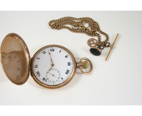 A 9CT. GOLD FULL HUNTING CASED POCKET WATCH the white enamel dial with Roman numerals and subsidiary seconds dial, 50mm. dia.