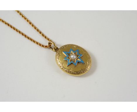 A VICTORIAN GOLD LOCKET PENDANT the front centred with a turquoise enamel star motif set with a pearl, with locket compartmen