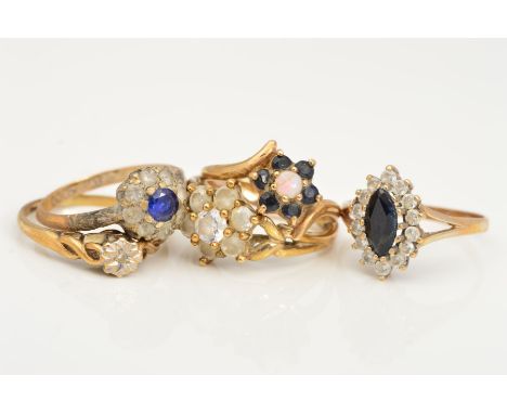 FIVE GEM SET RINGS, to include a single cut diamond in a star illusion setting, an opal and sapphire cluster ring, opal crack