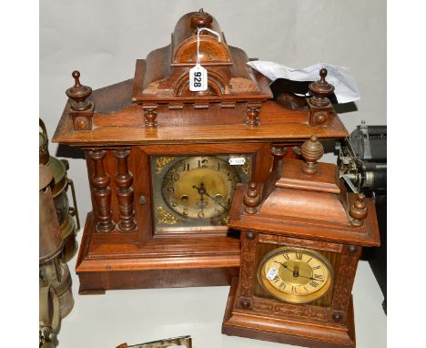 A MAHOGANY AND OAK MANTLE CLOCK, having carved pillars and finials (damage to veneer), silvered dial with gilt decoration, Ar