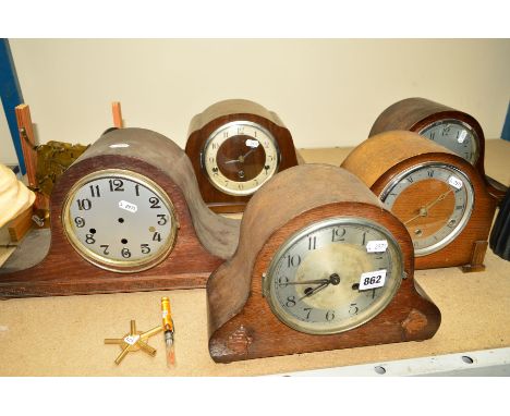 A GROUP OF FIVE DOME TOPPED MANTLE CLOCKS, (some a/f), clock workings on a stand, brass multi size winding key, pocket contai