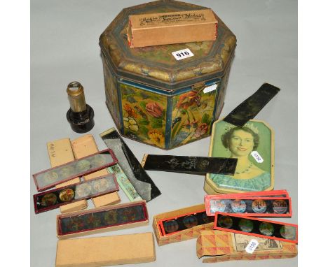 A COLLECTION OF OVER FORTY EARLY 20TH CENTURY MAGIC LANTERN SLIDES some featuring Minnie Mouse together with a lantern eye pi