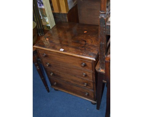 A MAHOGANY COMMODE IN THE FORM OF A GEORGIAN CHEST OF FOUR LONG DRAWERS, width 64cm x depth 50cm x height 80cm 