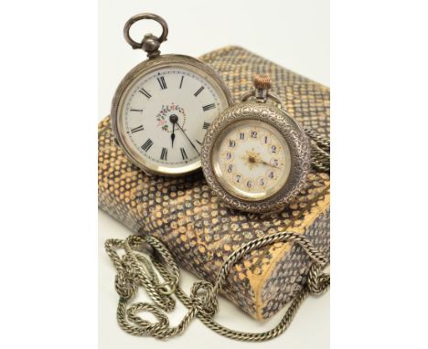 TWO EARLY 20TH CENTURY SILVER OPEN FACE POCKET WATCHES, both with white faces and engraved detail to back cases, the first wi