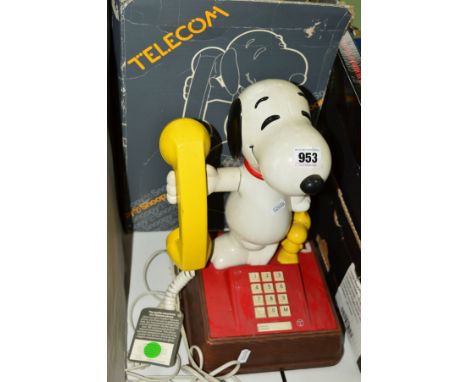 A BOXED TELECOM SNOOPY TELEPHONE, push button phone dial, approximate height 34cm (box distressed)