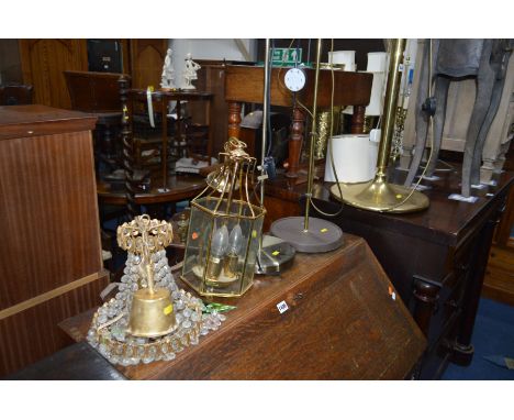 A MODERN BRASSED STANDARD LAMP with a shade together with two modern uplighter and two ceiling lights (5)
