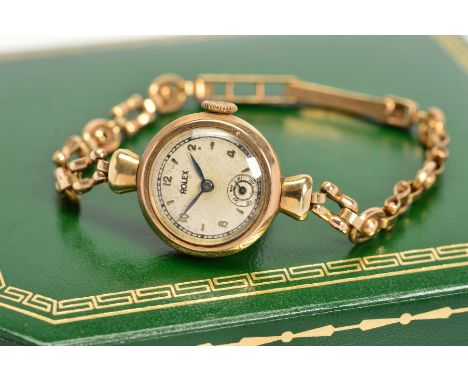 AN EARLY TO MID 20TH CENTURY 9CT GOLD LADIES ROLEX WRISTWATCH, refinished silvered dial signed 'Rolex', mixed applied Arabic 