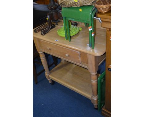 A MODERN BEECHWOOD SIDE TABLE on turned legs with a single frieze drawer shaped gallery back and undershelf width 96cm x dept