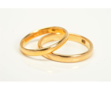 TWO BAND RINGS, both of plain design, the first with 22ct hallmark, approximate weight 2.9 grams, the second stamped 18, appr