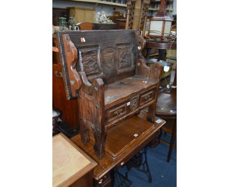 AN RUSTIC STYLE OAK MONKS BENCH with a single drawer