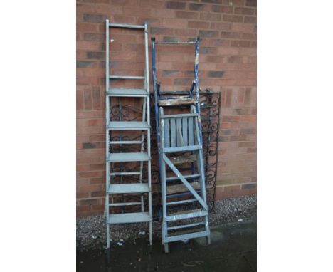 A PAIR OF BLACK PAINTED WROUGHT IRON DRIVEWAY GATES, width 123cm x height 102cm to each gate x overall width 246cm, together 