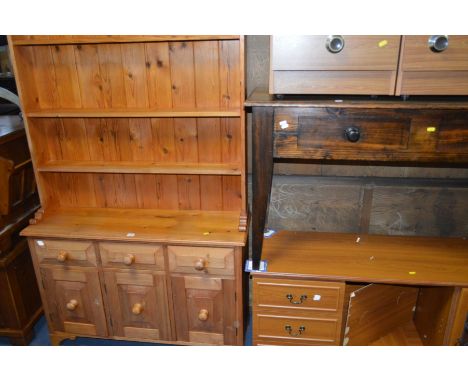 A NARROW PINE DRESSER, with three drawers, width 110cm x depth 34cm x height 195cm, together with a hardwood side table with 