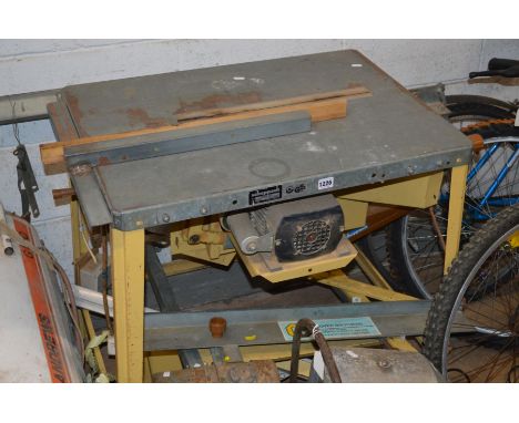 AN ELECTRIC  STEEL FRAMED JIGSAW BENCH and saw