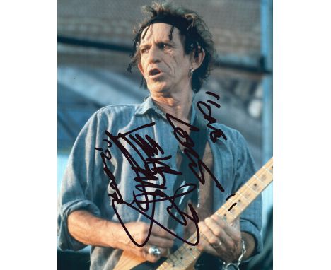 Keith Richards signed 10x8 colour photo. Keith Richards (born 18 December 1943), often referred to during the 1960s and 1970s