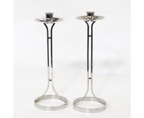 Pair Robert Welch secessionist-style silver-plated candlesticks, the sconces on double support stems and on circular ring bas