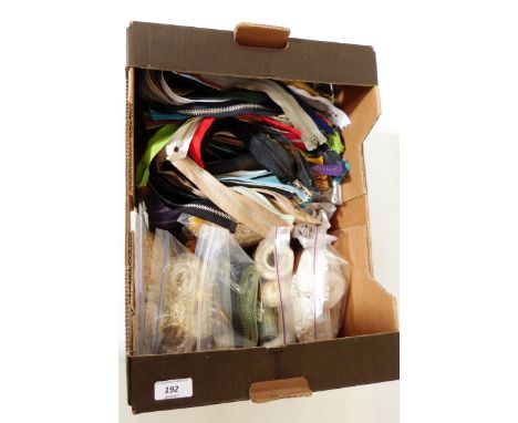 Quantity of sewing accessories including zips, buckles including some vintage bakelite examples, buttons, etc. (3 boxes) 