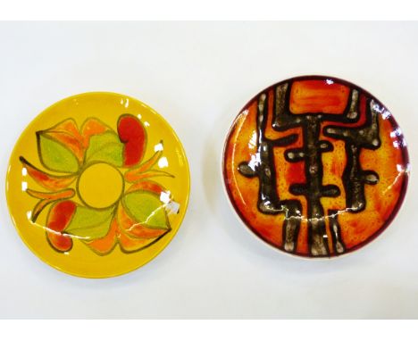 Four Poole Delphis pottery shallow dishes, model no.3, by Rosina St Clayre, Andree Fontana and other initialled 'R', all 20cm