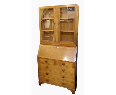 Arts & Crafts style Clarence Turner 'Clarry' oak bureau bookcase, the top with three shelves enclosed by pair glazed panel do