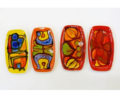 Four Poole Delphis pottery dishes by Ros Sommerfelt, Cynthia Bennett, Pamela Bevans and another monogrammed 'AA', each pin tr
