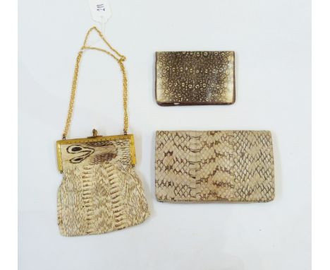 Vintage snakeskin evening bag lined with silk and embroidered rosettes, a snakeskin wallet and a snakeskin small clutch bag w