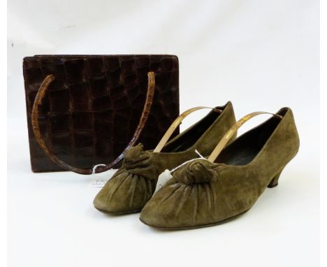 Vintage crocodile fixed-frame handbag with two carry handles and a pair of vintage Joan & David Couture suede shoes in sage g