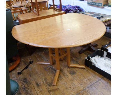 Ercol elm oval drop-leaf dining table with central quadruple panelled square section supports opening to 116cm long overall 