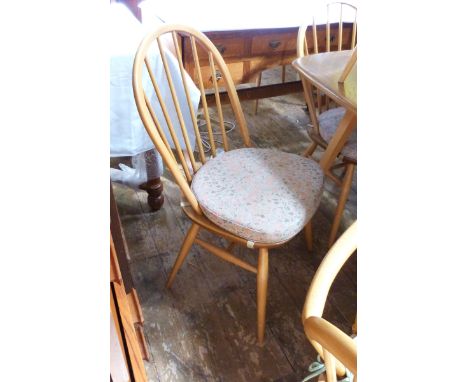 Set of  Six Ercol elm and beech dining chairs, rounded railback with seat cushions, dated 1993 