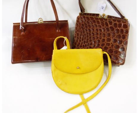 Vintage fixed-frame crocodile leather handbag, a yellow leather Charles Jourdan shoulder bag and another fixed-frame bag (3) 