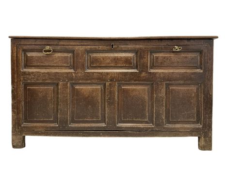 18th century and later oak coffer, the hinged lifting lid over fall front, opening  to reveal one shelf, raised on stile supp