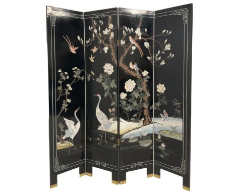 Ebonised Chinese four panel screen, with carved birds and foliate 