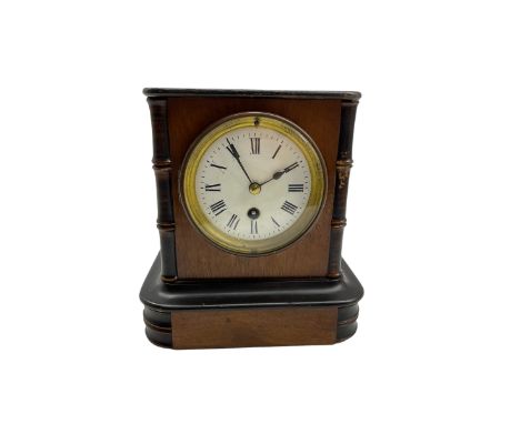 French timepiece mantle clock c1890 in a mahogany case with ebonised detail, enamel dial with roman numerals and steel spade 