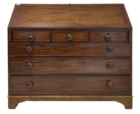Henry Walker of Lancaster - George III mahogany bureau, fall front enclosing fitted interior, three short drawers over three 