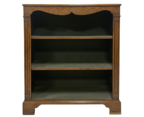 20th century oak open bookcase, fitted with two adjustable shelves, raised on bracket supports Dimensions: Height:&nbsp;104cm