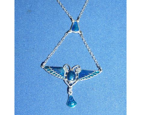 A silver and enamel scarab necklace 
We will post this item worldwide at cost.