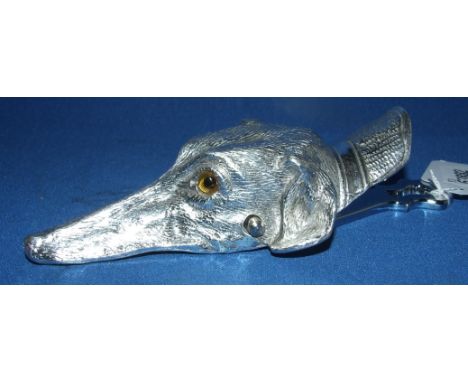 A plated paper clip holder in the form of a dog, 15 cm
We will post this item worldwide at cost. 