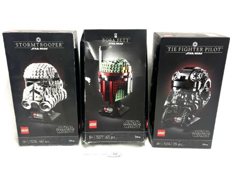 Lego Star Wars Helmet sets x 3 Lego Star Wars Helmet sets x 3 including 75276 Stormtrooper, 75277 Boba Fett and 75274 TIE Fig