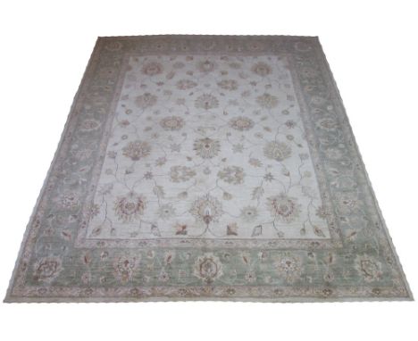 FINE ZIEGLER FARAHAN CARPET, 304cm x 242cm, palmettes and flower heads on an ivory field within a corresponding jade border.