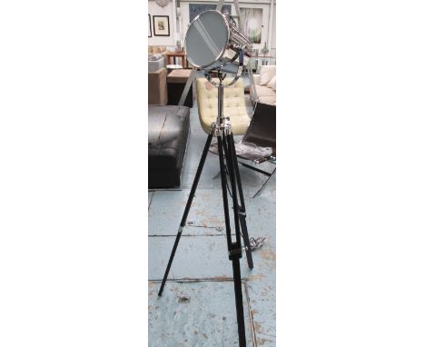 SPOTLIGHT, chromed metal on extendable wooden tripod supports, 150cm H. 