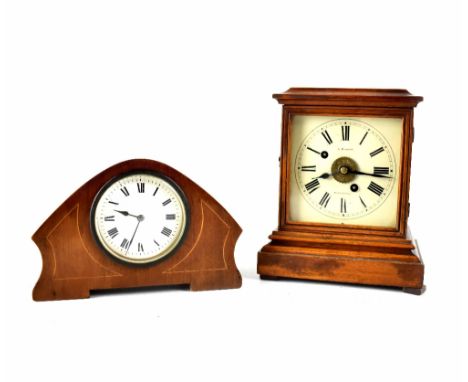 A late 19th/early 20th century German Winterhalder & Hofmeier walnut-cased alarm timepiece of rectangular form, the door encl