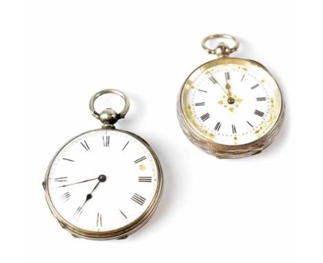 Two silver open faced fob watches, one .935 grade silver, the white dial set with Roman numerals and floral gilt embellishmen