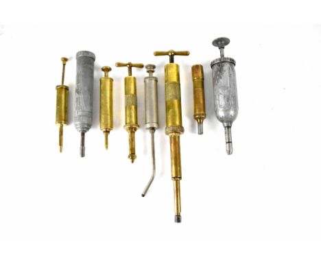 Eight vintage brass and other metal small grease guns to include two Enots 'Autoram grease gun' (two sizes) (8).