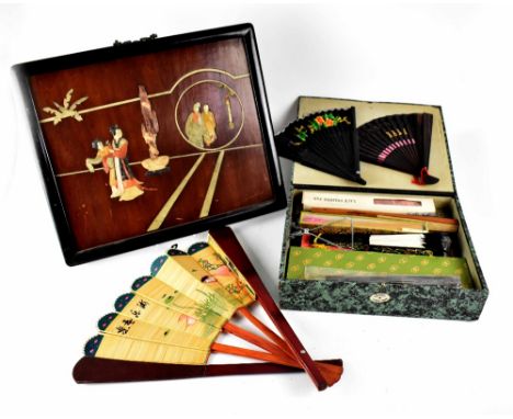 A quantity of various modern and vintage Chinese and other hand fans, some boxed, also a Chinese wall-hanging wooden panel de