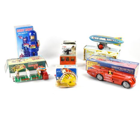 A group of wind-up tinplate toys to include a Schylling Collectors' Edition Horse Race, a Schylling Colelctors' Series Zeppel